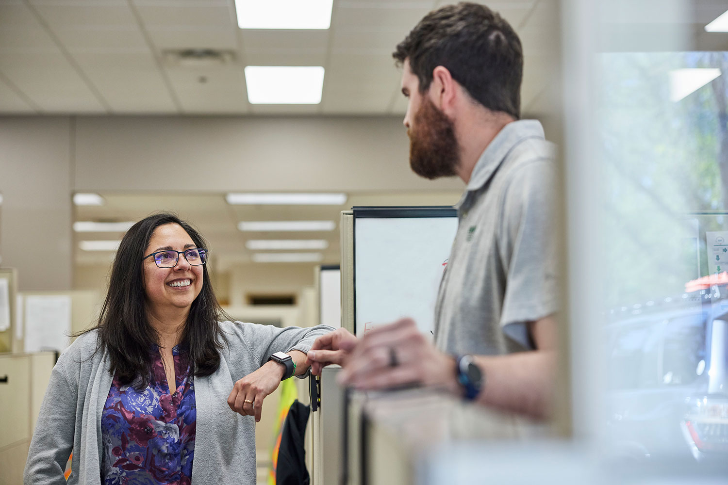 Employees talking in an office