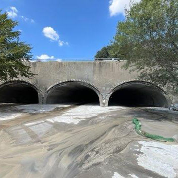 Culvert with water flowing through it
