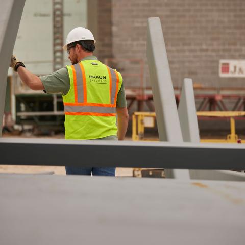 Man in PPE conducting inspections