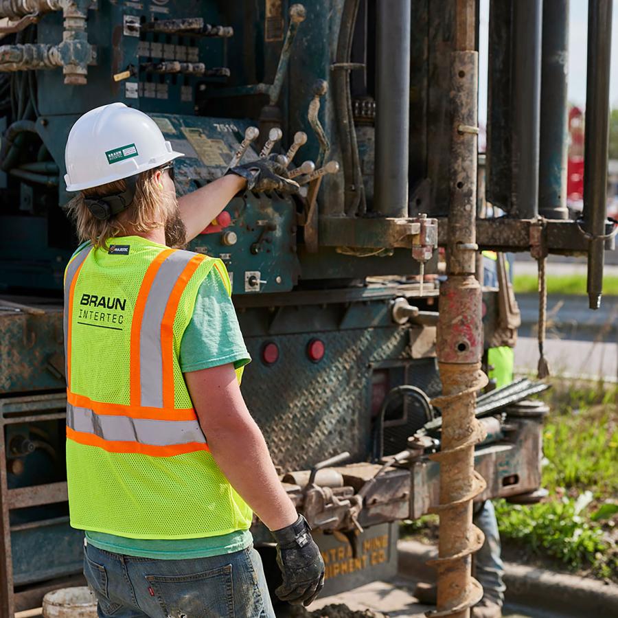 Person using a drill rig